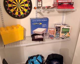 Dart board with darts, board games legos bowling balls with bags
