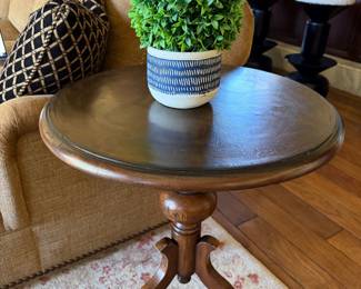 Round wooden side table