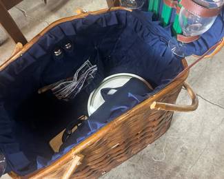 Picnic basket with glasses, plates, and knives, c.1935