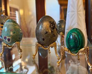 Marble stone eggs on gilded stands