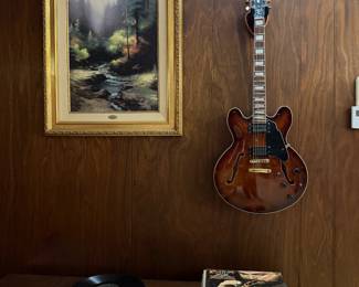 Grote electric guitar and records 