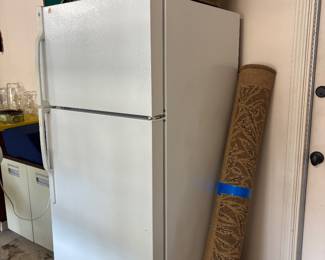 Refrigerator/freezer, rug, basket boxes