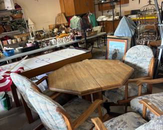 Game table it has a leaf to extend length has 6 chairs
