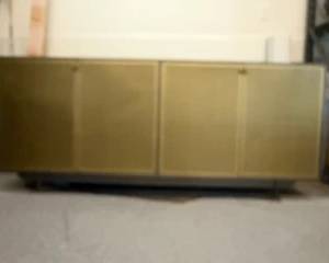 Front View of Four Door Gold and Charcoal Credenza