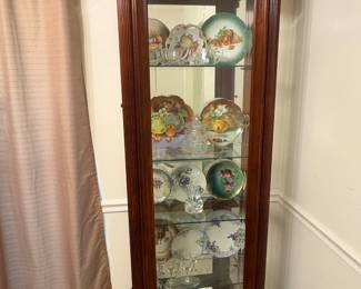 Nice lighted curio cabinet