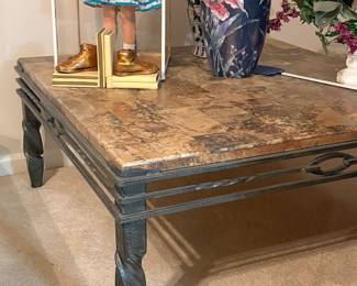 Wrought iron and stone coffee table