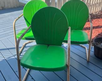 Green metal chairs