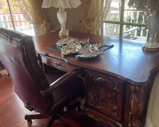 Leather executive chair, wooden desk