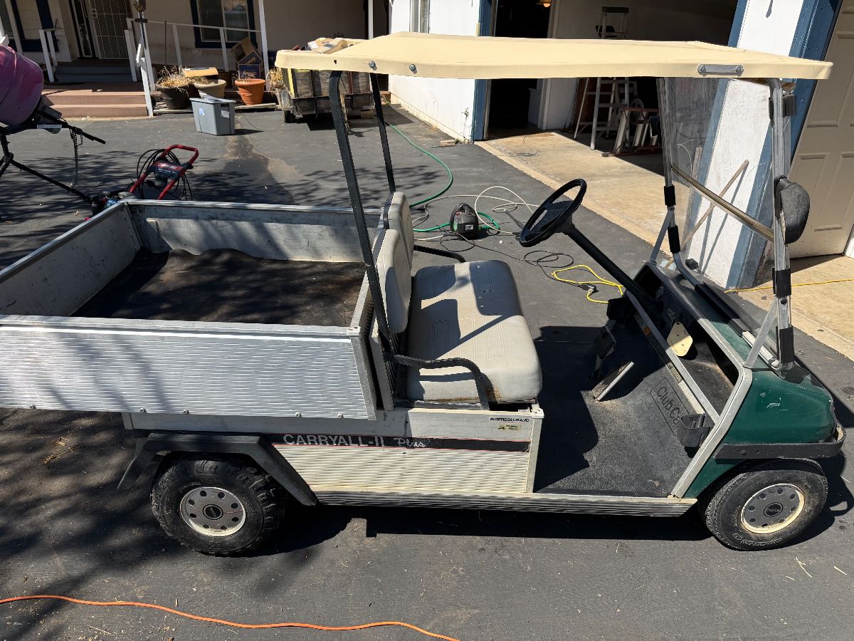 Gas powered with electric dump bed