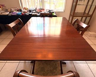 $450 (Duncan Phyfe Table w/chairs, leaves, table pads)