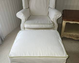 Slipcovered wingback chair and ottoman