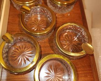 Crystal and brass ashtray set