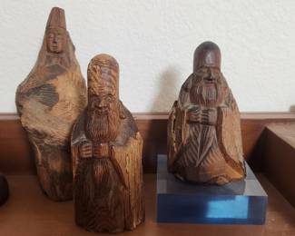 Japanese carved wooden figures including Daruma