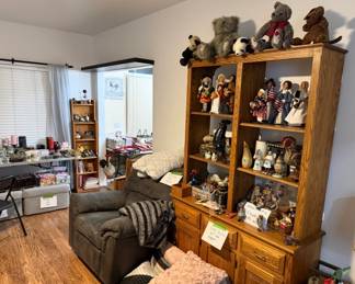 Bookcases, Recliner, Decorative Pillows, Byer's Choice Carolers