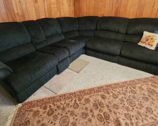 Reclining sectional with sleeper
