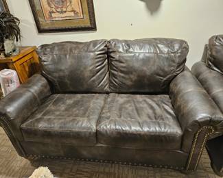 Leather style loveseat 