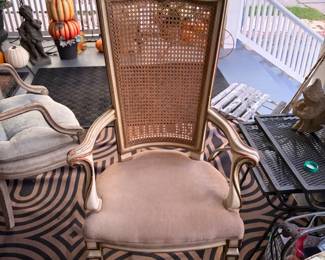Cane back upholstered arm chair 