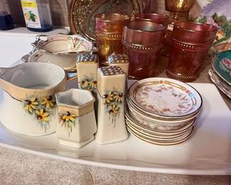 Ceramic dishes with floral designs.