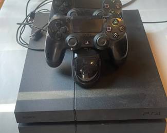 Sony PlayStation 4 PS4 Gaming Console With Two Remotes On Stands  Cords