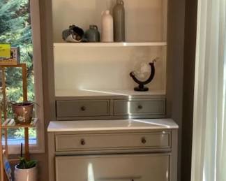Display Shelf and Cabinet with Candlesticks Pottery and Bottle Decor