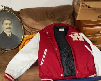red + white varsity Letterman Jacket with W patch and a particularly distinguished ancestor in an oval frame