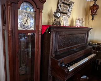 Grandfather clock and antique piano