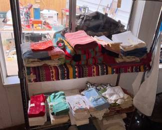 RACK FULL OF LINENS