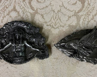 Lot 35: Two metal belt buckles with embossed designs