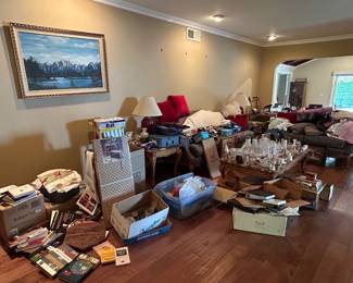 The living room before and after Heritage Staging. 