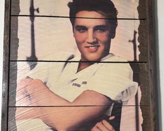 A massive Elvis Collection! Concert posters, dolls, records, photos. Tons and Tons of Elvis collectibles
