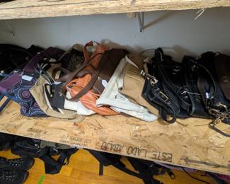 Purses in many styles including clutch, wristlet, crossbody, hobo, and backpack, including brand names Coach, Fossil, Michael Kors, Kate Spade, Mimeo, many leather purses, and others as well!