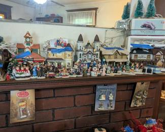 CHRISTMAS DÉCOR: Christmas village (ceramic and resin), including “It’s a Wonderful Life” house and family, Nutcrackers, Snowmen, door hangings, stockings and hangers, ornaments, table settings & kitchen items, matching bathroom décor set from Lenox, all from brand names including Lenox, Avon, Department 56, Dayton’s, Hallmark, and more!