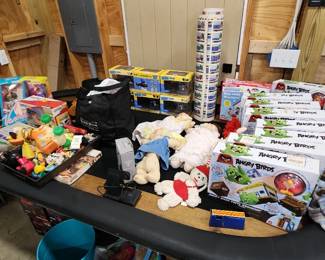 Vintage toys. Super nintendo console and other goodies amongst this poker table that you need in the man cave