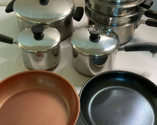 Lot 77: Stainless steel cookware set with lids, steamer insert and nonstick frying pans