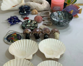 Lot 47: Coastal Themed Decorative Shells, Fish Figurines, and Glass Decor Assortment