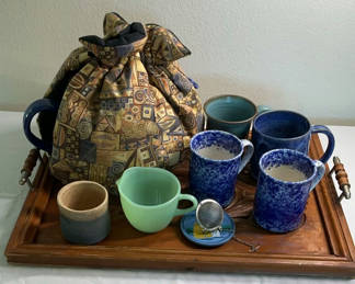 Lot 56: Blue ceramic teapot with mugs and kitchenware on a wooden tray