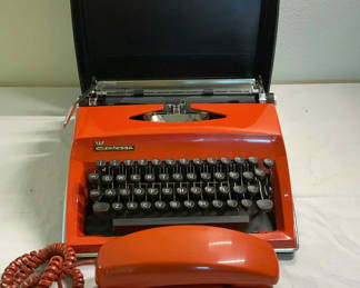 Lot 79: Vintage Orange Contessa Typewriter with case, and vintage orange phone
