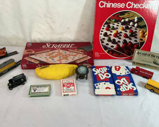 Lot 166: Assorted Board Games, Toy Vehicles, and Collectibles