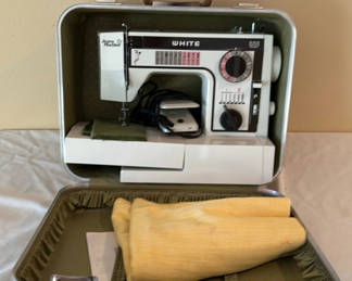 Lot 43: 'White' Sewing Machine Model 1077 with case