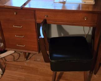Mid Century Singer Sawing Machine. Flips down to store
