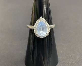 720h Sterling silver ring with light blue cubic