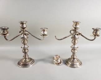 573 Pair of sterling silver weighted candelabras