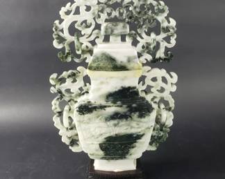 040 162 Carved jadeite urn sculpture on a wooden base
