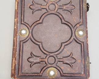 88 Antique embossed leather photo album with some