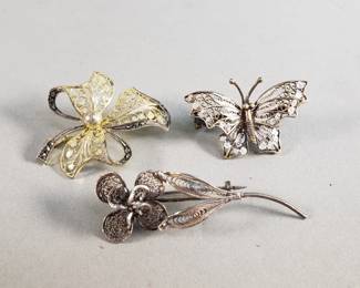138 Group of silver brooches, two 800 silver