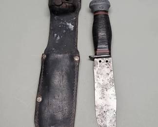 525 WWII era survival knife with stack leather and