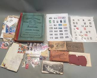 435 Group of vintage stamps and postcards