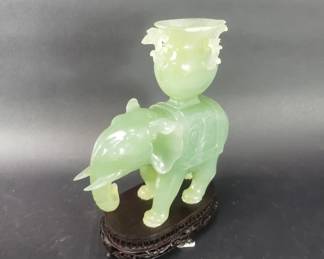 161 Carved green elephant sculpture