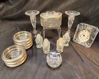 615 Glass candlesticks, coasters, lighter, clock,
