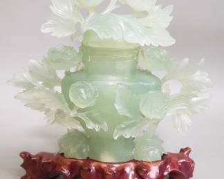 103 572 Carved jadeite sculpture featuring an urn and